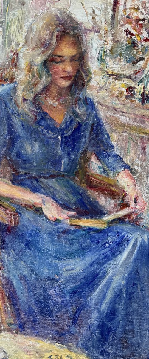 Woman in a blue dress by Liubou Sas