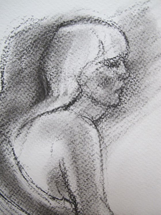 seated female nude