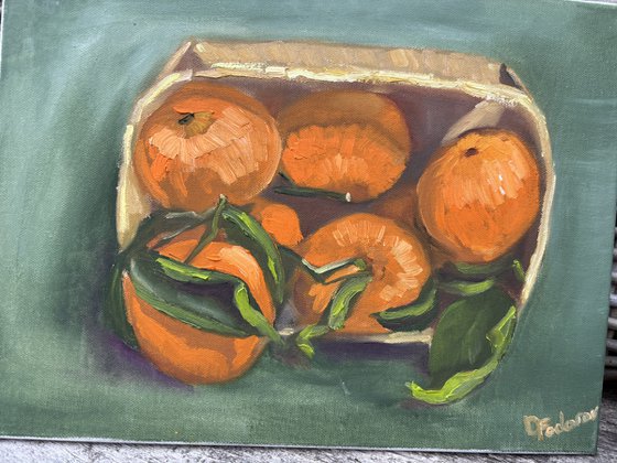 Tangerines in a wooden basket