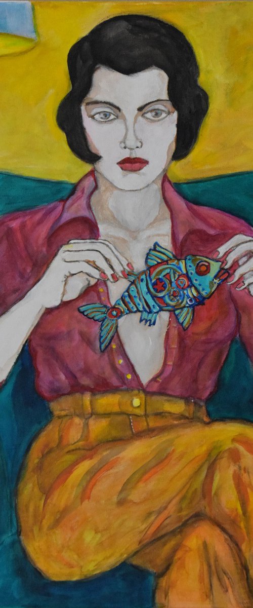 Woman playing with a mechanical fish by Nagui