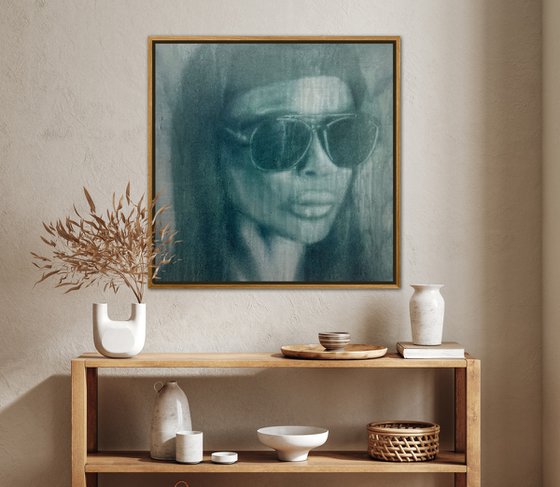 statement artpiece of strong looking fierce beautiful women with sunglasses in dark grey brown blue colors. Oil painted in splatters on canvas