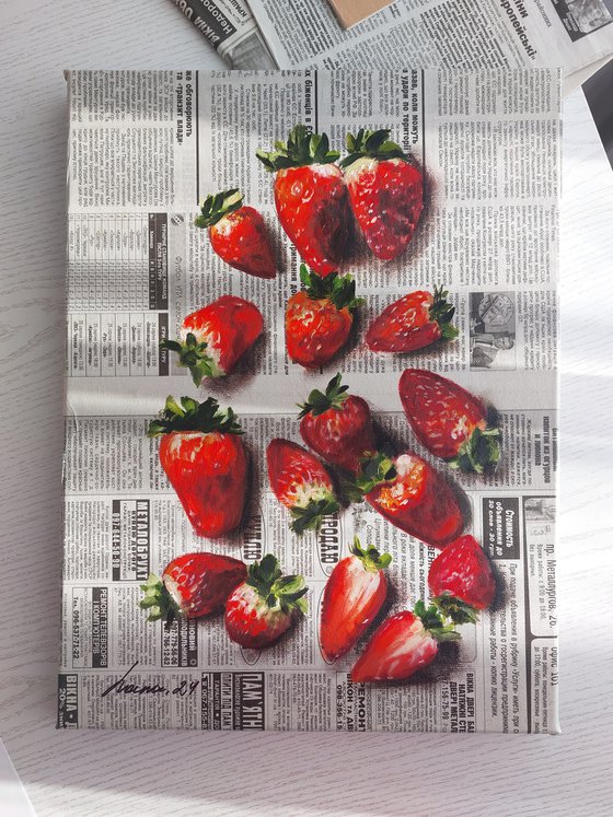 Strawberries on newspaper