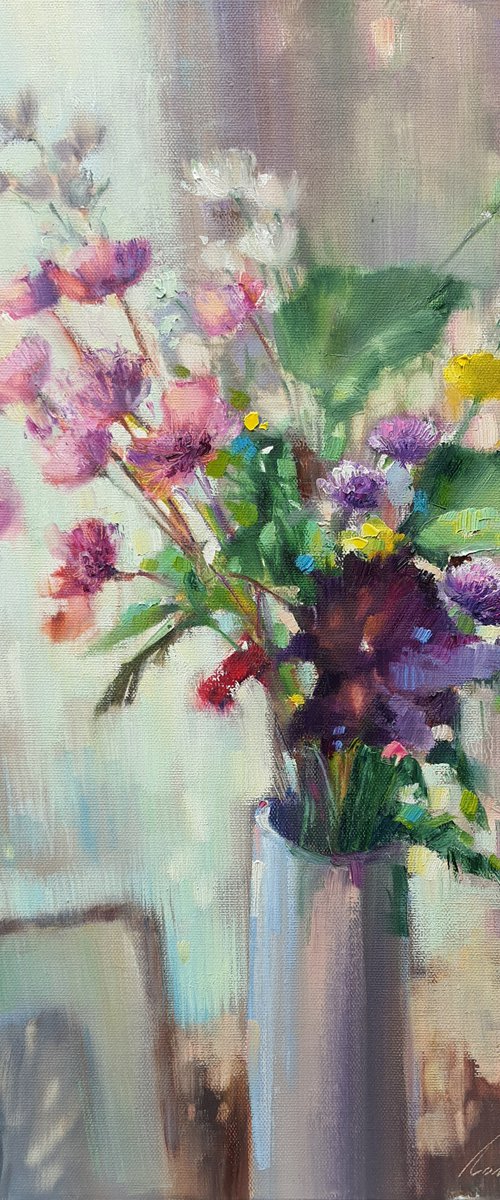 Flowers and a painting by Olha Laptieva