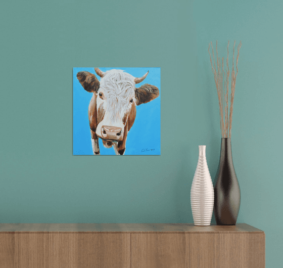 Cow portrait painting in blue