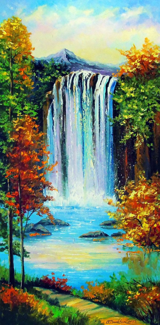 Mountain waterfall by the lake