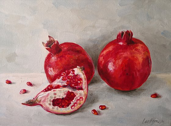 Red juicy pomegranate still life