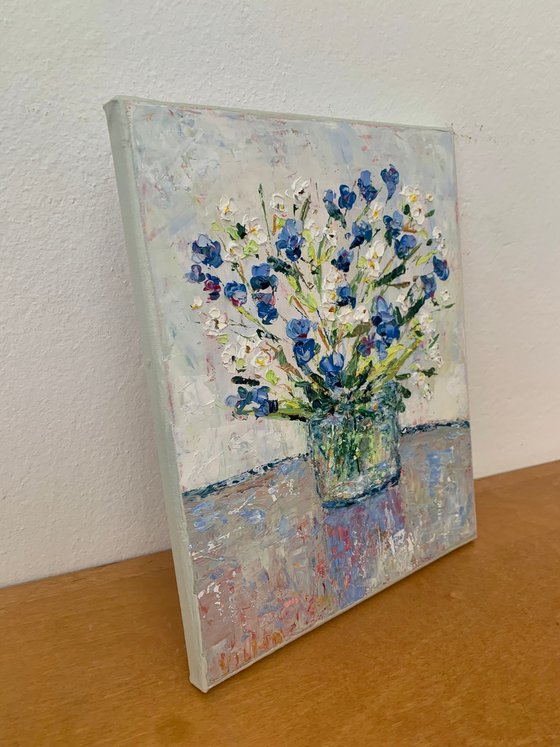 Bouquet of daisies and cornflowers