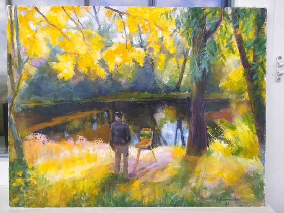An artist near the lake