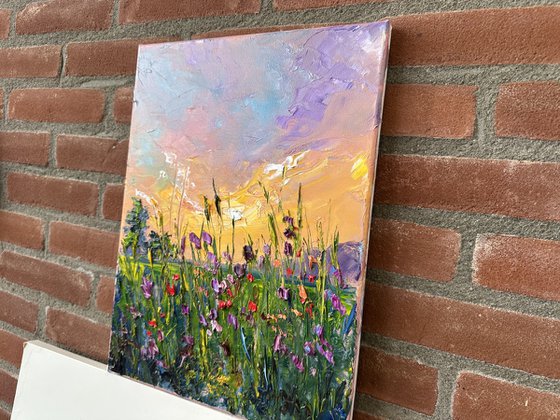 Yellow sunset with flowers