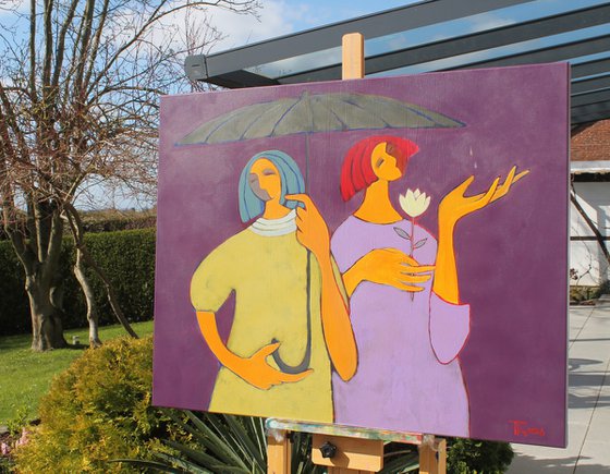 Two under an umbrella.