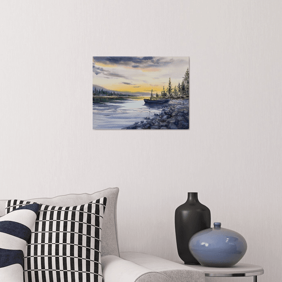 A lonely boat at sunset