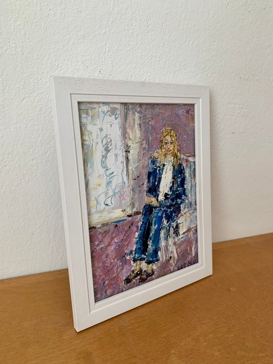 Portrait of a seated young woman