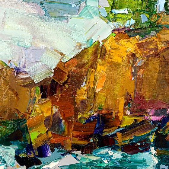 AT THE EDGE OF THE SEA