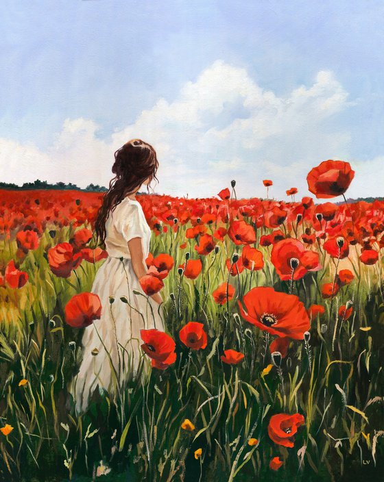 Woman in a red poppy field