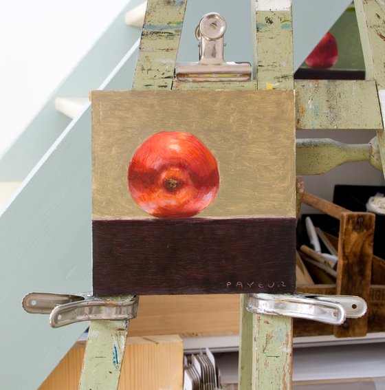 still life of fresh red apple on ocher background