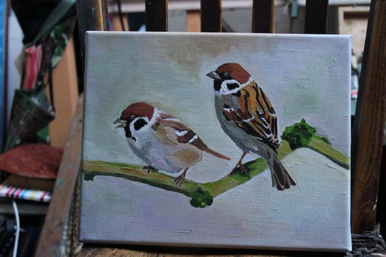 Two Sparrows On A Branch