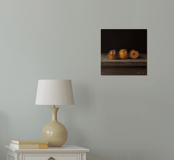 Plums on a Wooden Table
