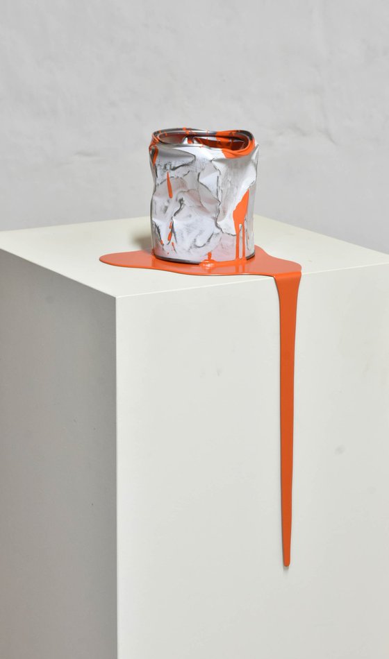 The old orange paint can