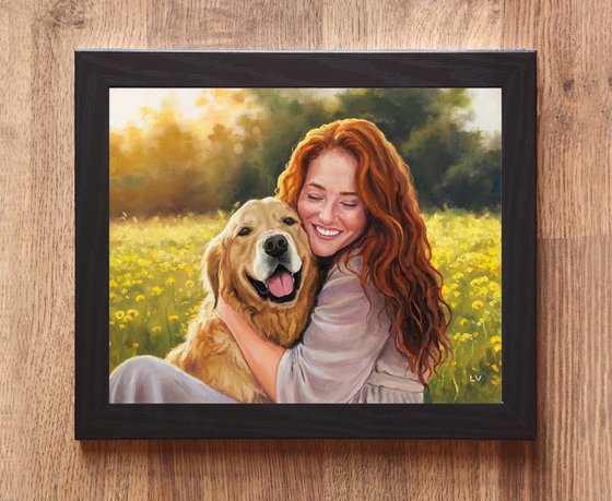 Smiling red-haired woman hugging a dog