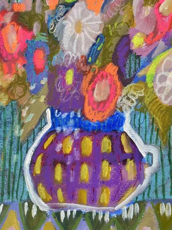 Flowers in purple vase