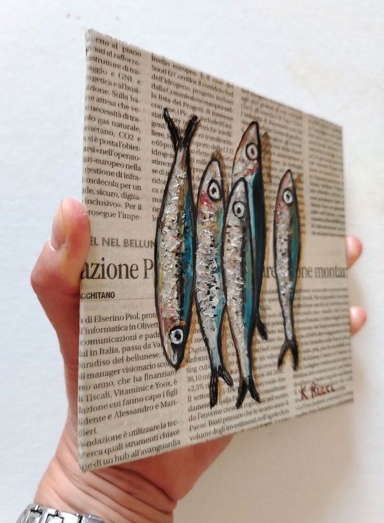 Small Fishes on Newspaper