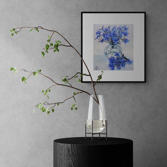 Blue Asters In A Glass Vase
