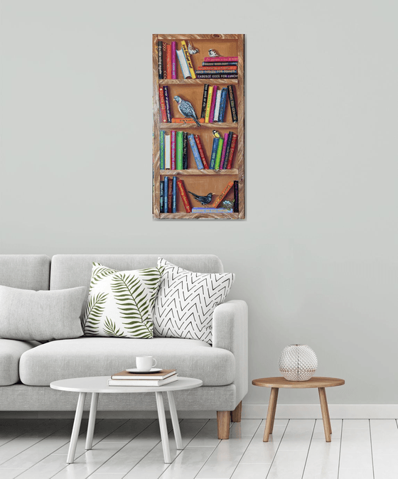 Bookshelf with birds