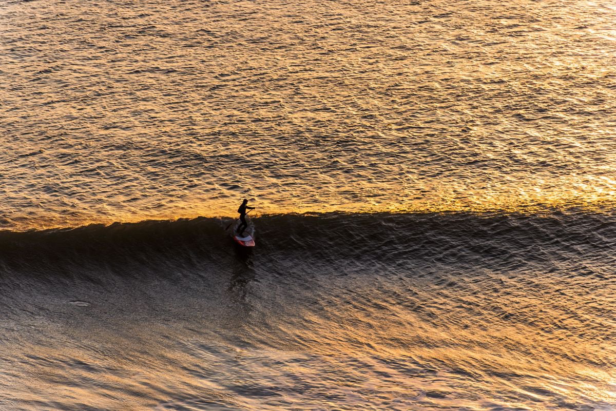 SUNSET SURFING by Andrew Lever