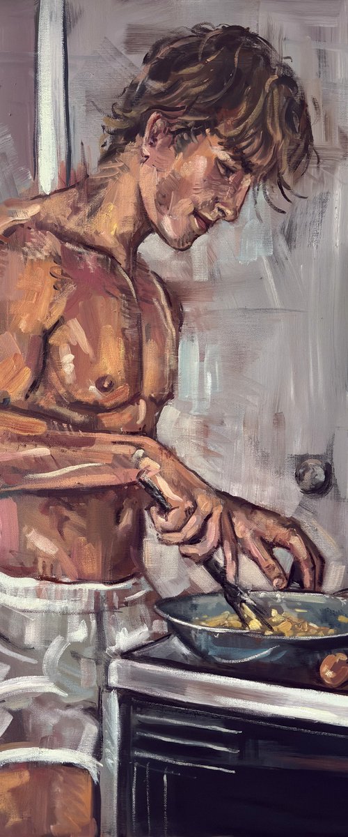 Young man cooking by Emmanouil Nanouris