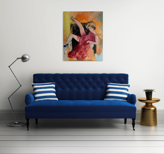 Woman sitting on the armchair