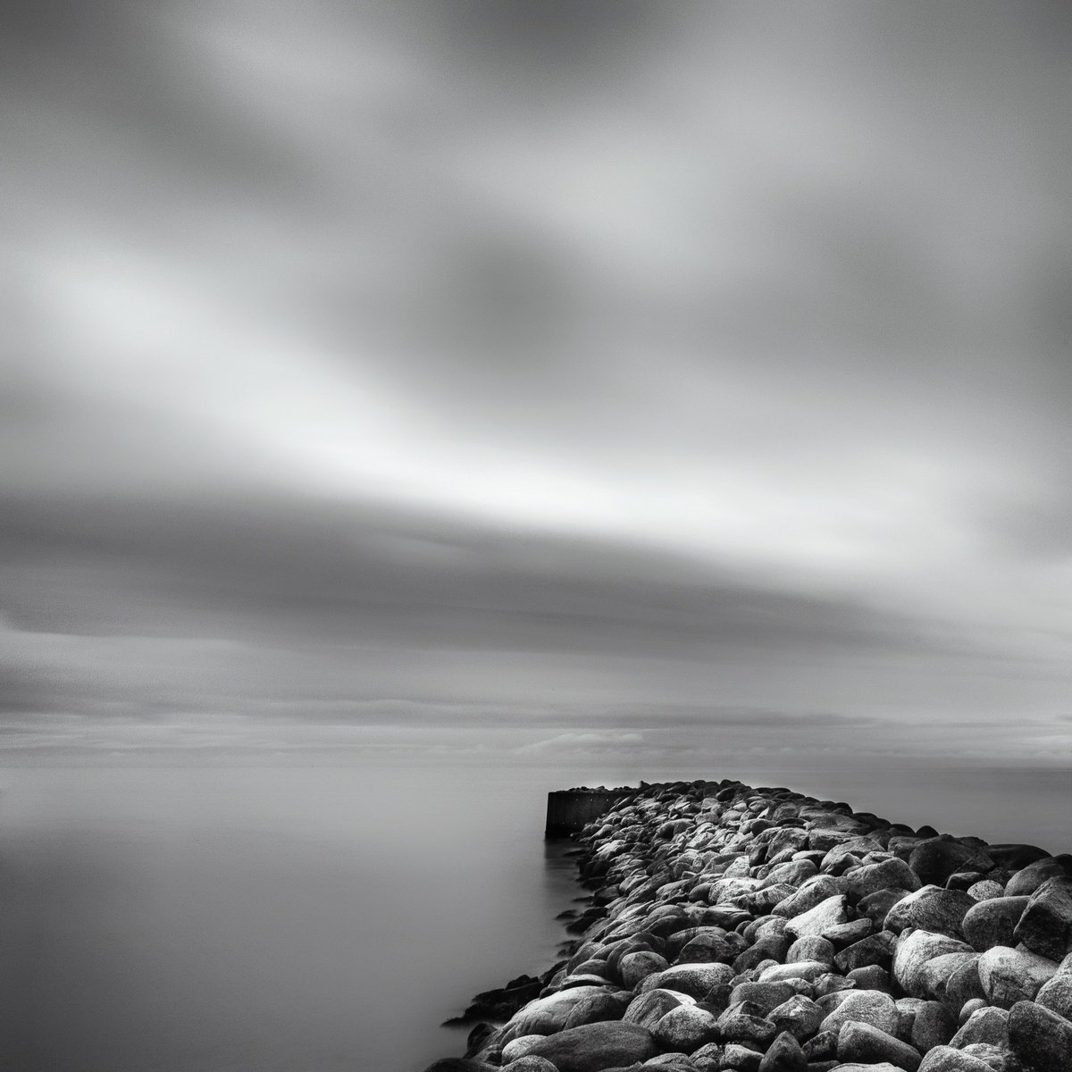 Danish stone jetty by Karim Carella