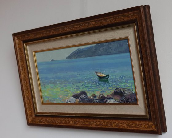 A boat at noon. Turunc