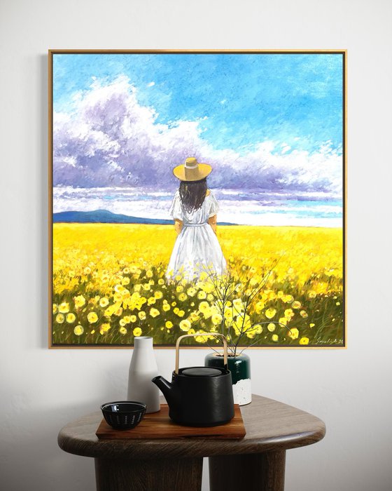 Summer. Woman in flower field