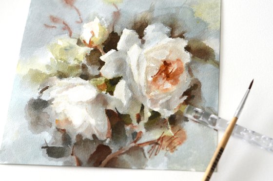 Light roses on a gray background