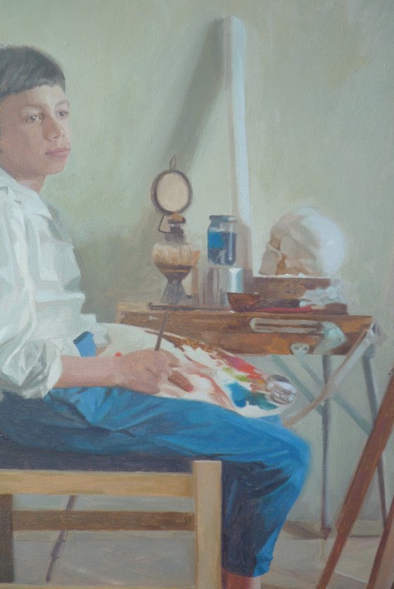 Boy infront a tripod