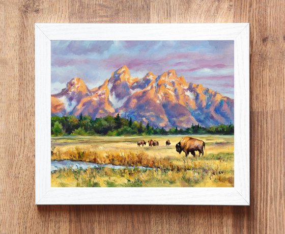 Teton mountain landscape with bisons