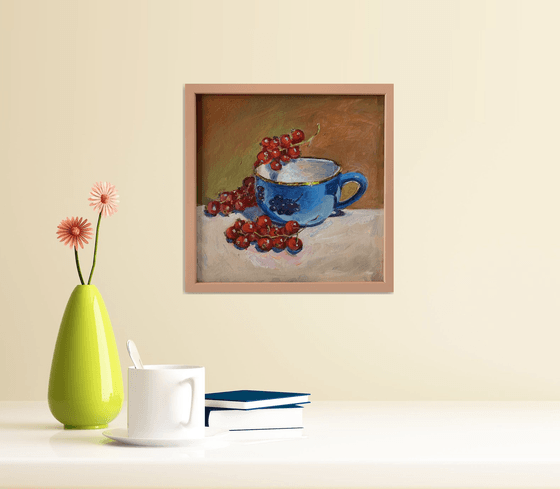 Tea Cup and red currants.