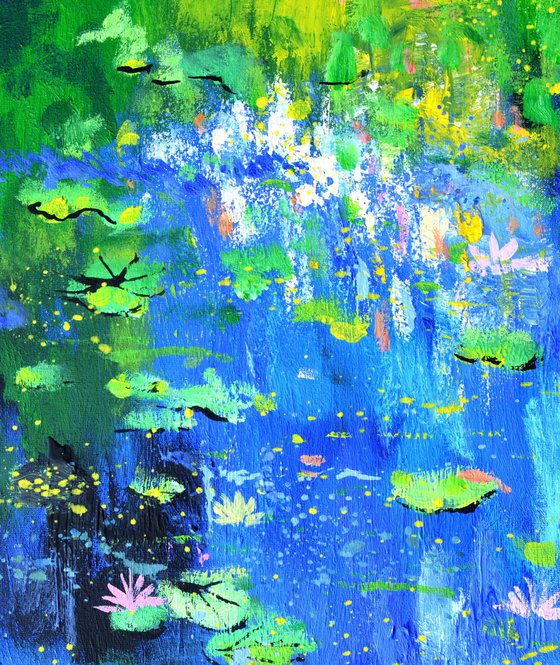 Waterlilies on a blue pond