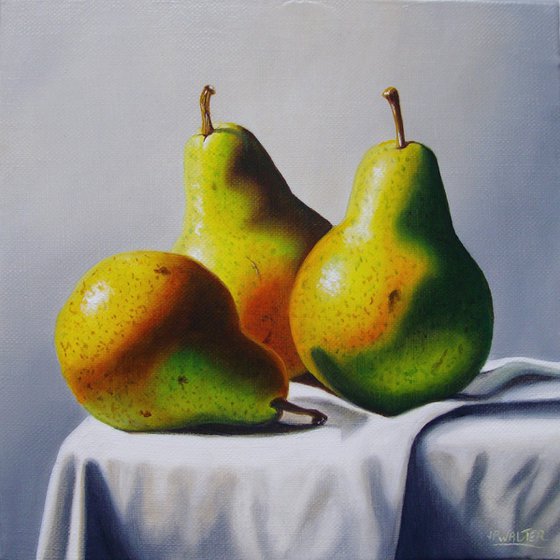 3 pears on white cloth