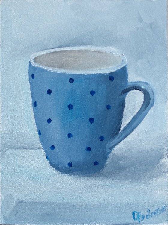 Polka dot teacup still life