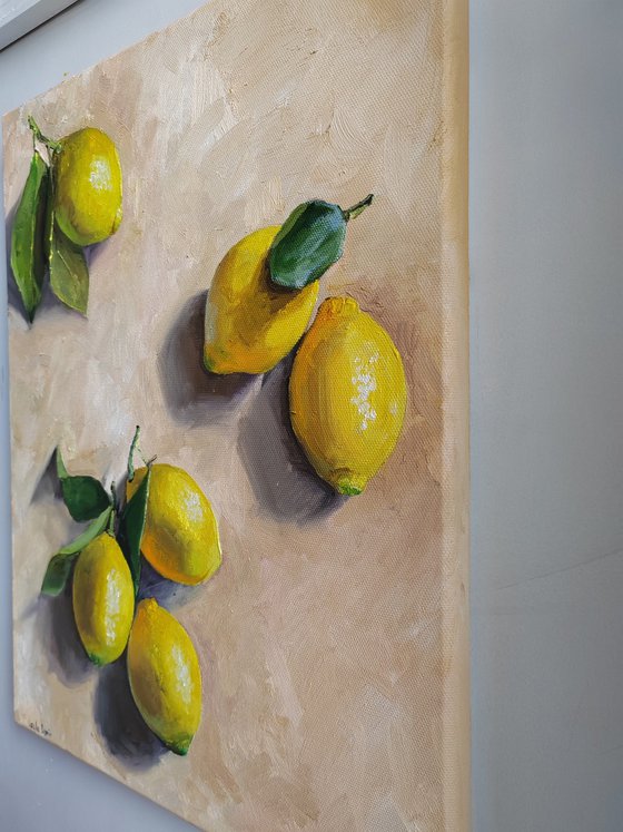 Lemon on cream background still life