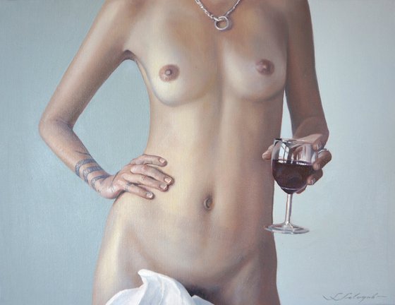 Nude with glass of wine.