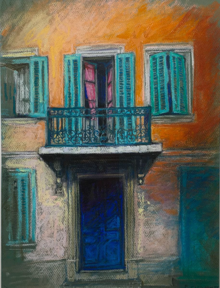 blue shutters and balcony in France by Patricia Clements