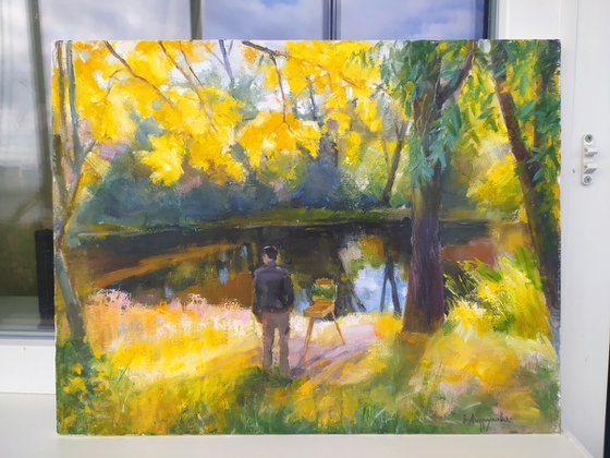 An artist near the lake