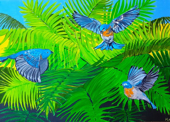 Tropical birds in flight