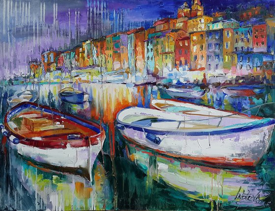 Boats in the evening city