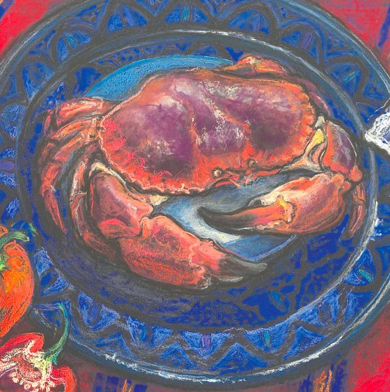 Crab, candle and Chilies on red