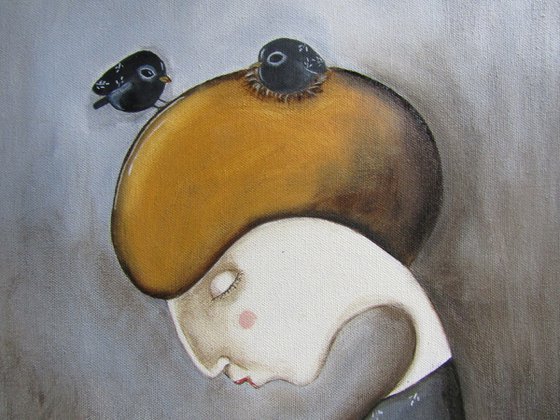 The blond woman with a couple of blackbirds on her hair
