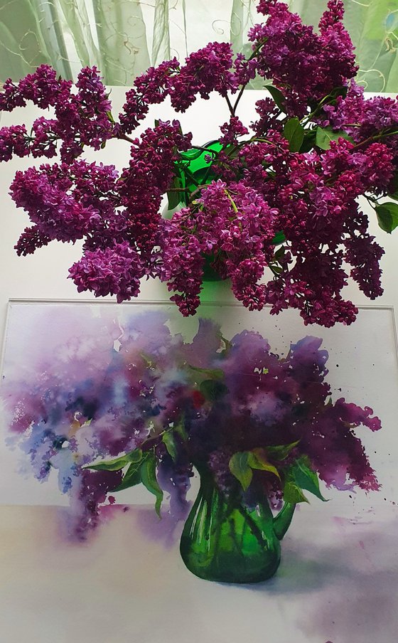 Spring bouquet: lilacs in green jug