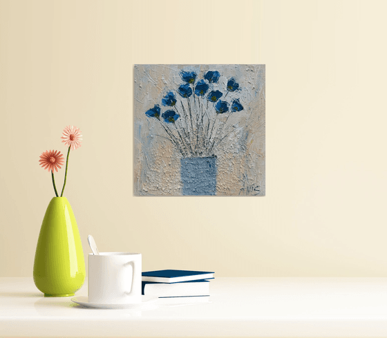 Blue Flowers in a Vase